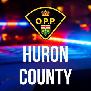 Ontario Provincial Police crest over a blurred background