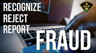 Close-up of hands typing on a laptop keyboard.