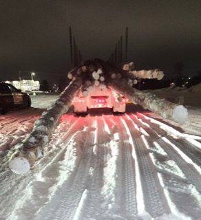 Snow-covered road with tire tracks
